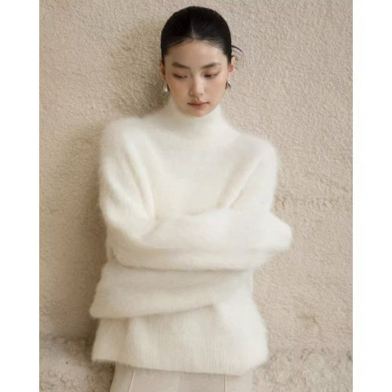 Éva — Pull duveteux à col montant — Blanc