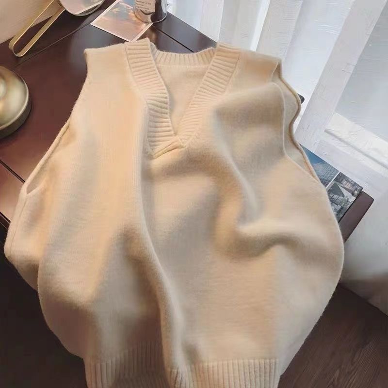 Lison — Pull sans manches à col V et bas fendu — Écru