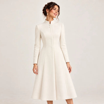 Camille — manteau ivoire à taille marquée